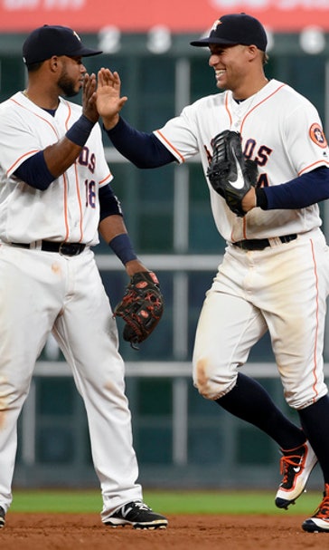 Castro homers, drives in 4 to help Astros rout Twins 16-4